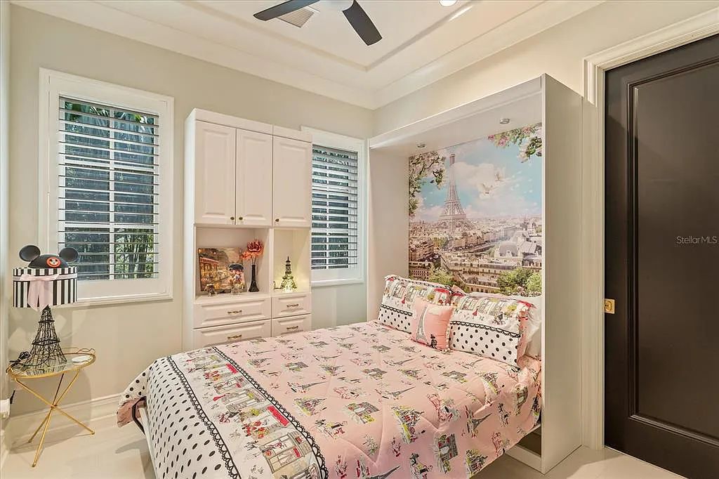 Live in luxury at the Four Seasons Private Residences 10242 Summer Meadow Way in Golden Oak, Orlando, Florida.