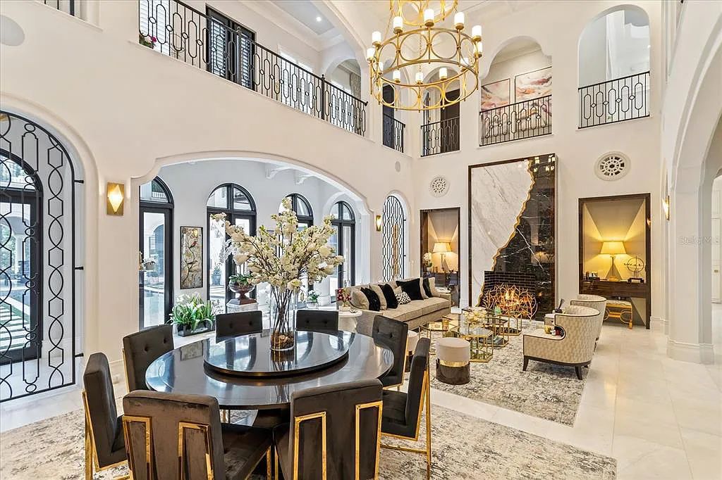 Live in luxury at the Four Seasons Private Residences 10242 Summer Meadow Way in Golden Oak, Orlando, Florida.