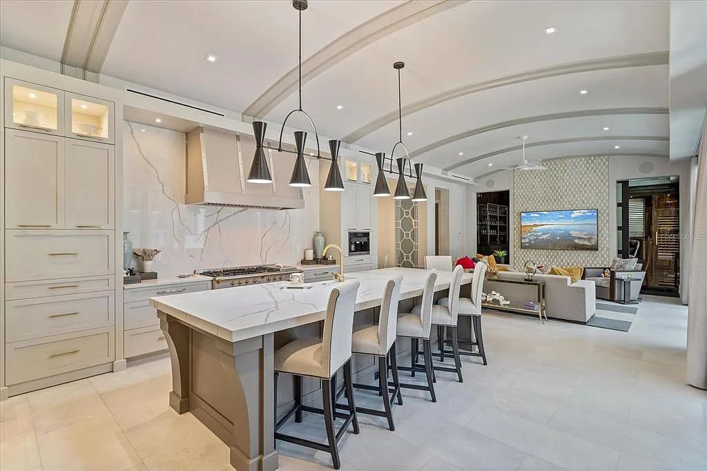 Live in luxury at the Four Seasons Private Residences 10242 Summer Meadow Way in Golden Oak, Orlando, Florida.