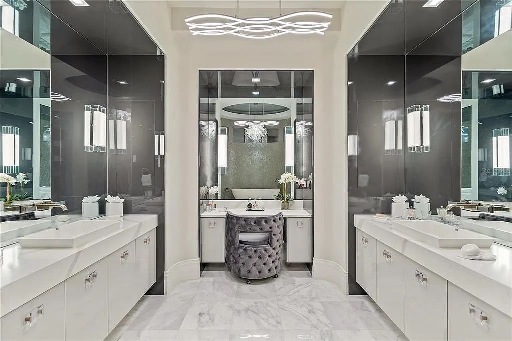 Live in luxury at the Four Seasons Private Residences 10242 Summer Meadow Way in Golden Oak, Orlando, Florida.