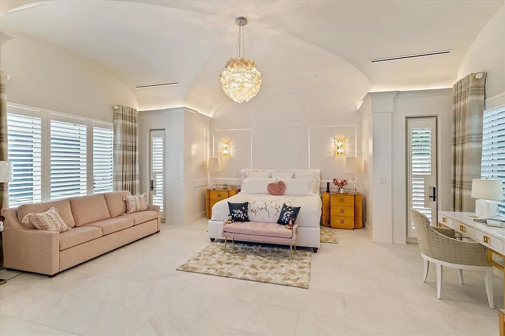 Live in luxury at the Four Seasons Private Residences 10242 Summer Meadow Way in Golden Oak, Orlando, Florida.
