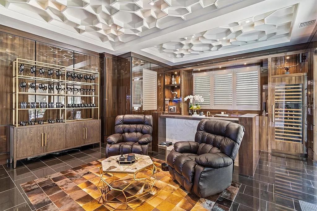 Live in luxury at the Four Seasons Private Residences 10242 Summer Meadow Way in Golden Oak, Orlando, Florida.