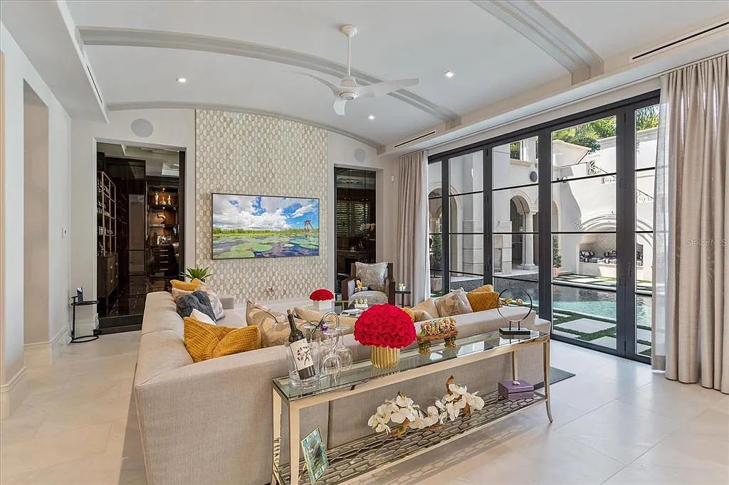 Live in luxury at the Four Seasons Private Residences 10242 Summer Meadow Way in Golden Oak, Orlando, Florida.
