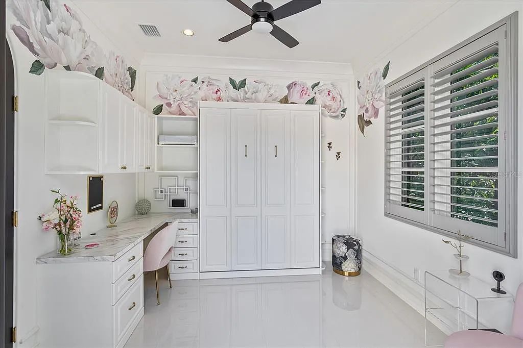 Live in luxury at the Four Seasons Private Residences 10242 Summer Meadow Way in Golden Oak, Orlando, Florida.