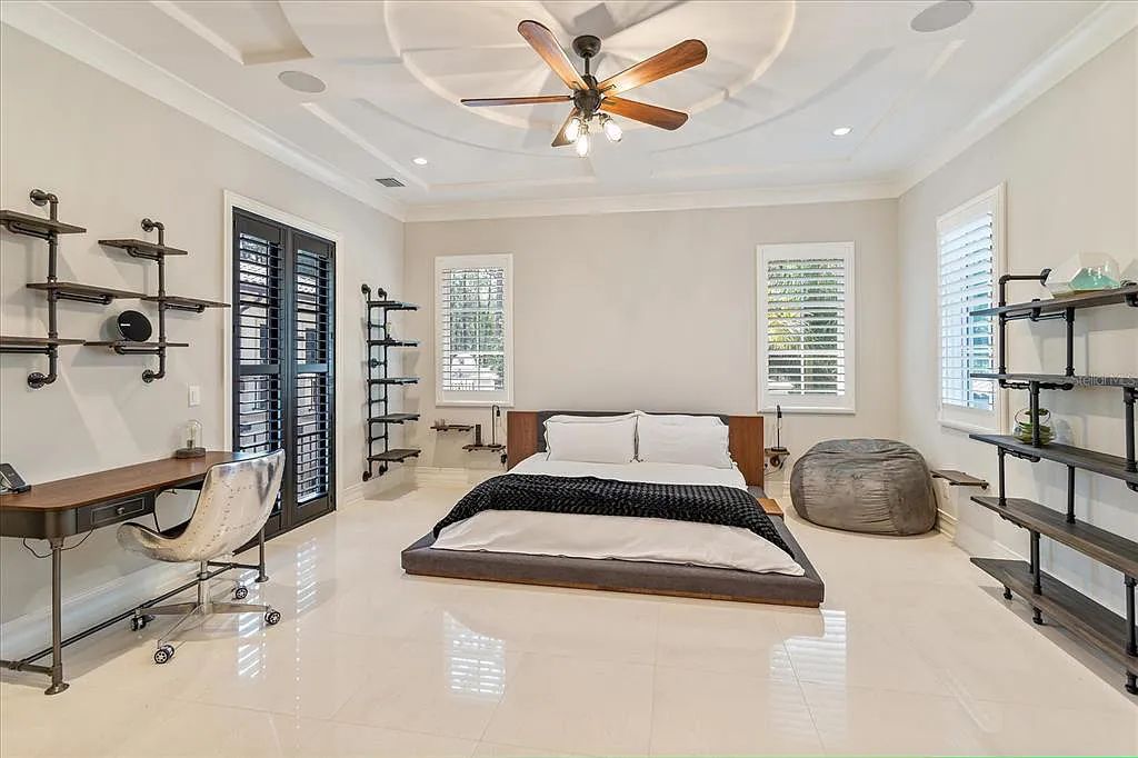 Live in luxury at the Four Seasons Private Residences 10242 Summer Meadow Way in Golden Oak, Orlando, Florida.