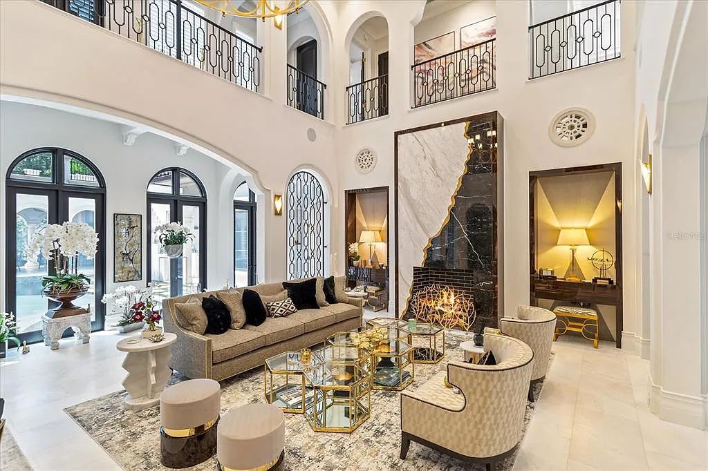 Live in luxury at the Four Seasons Private Residences 10242 Summer Meadow Way in Golden Oak, Orlando, Florida.