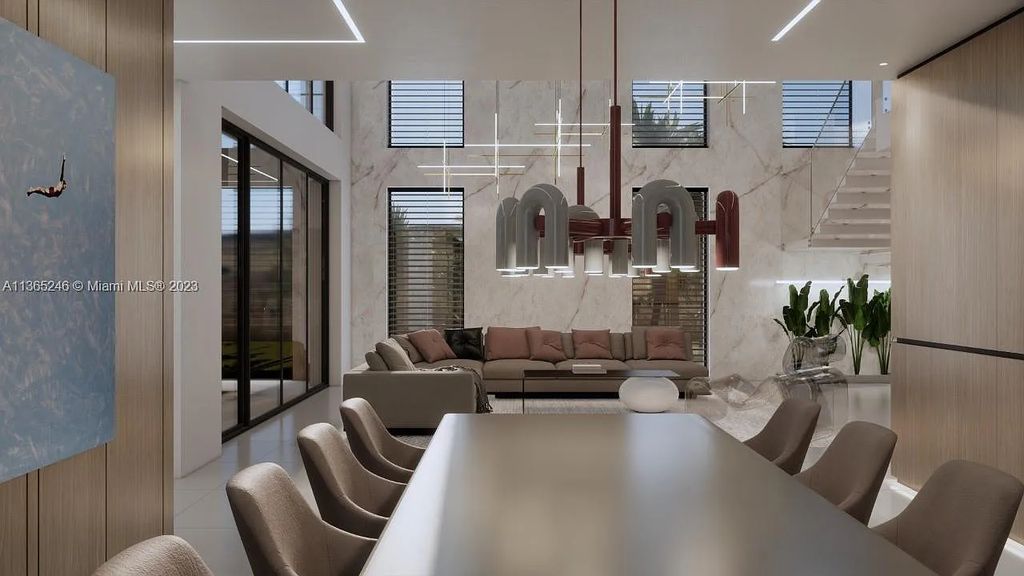 Introducing a luxurious waterfront property at 769 NE 77th Terrace, Miami, Florida. This newly built home boasts 5 beds, 7 baths, and 5,427 sqft of living space. Located in Belle Meade, Miami's gated community, with easy access to Midtown, Design District, and Brickell.