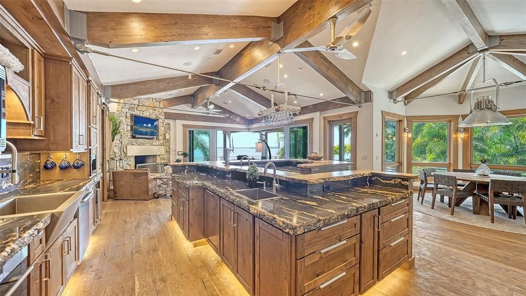 Experience luxury waterfront living at its finest with this stunning custom estate in 10216 46th Avenue W, Bradenton, Florida.