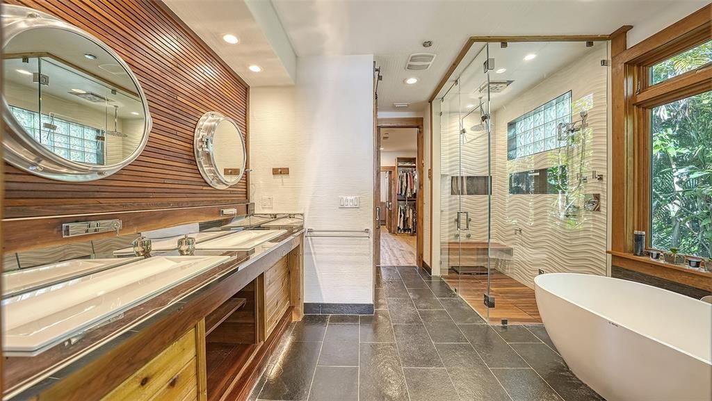 Experience luxury waterfront living at its finest with this stunning custom estate in 10216 46th Avenue W, Bradenton, Florida.