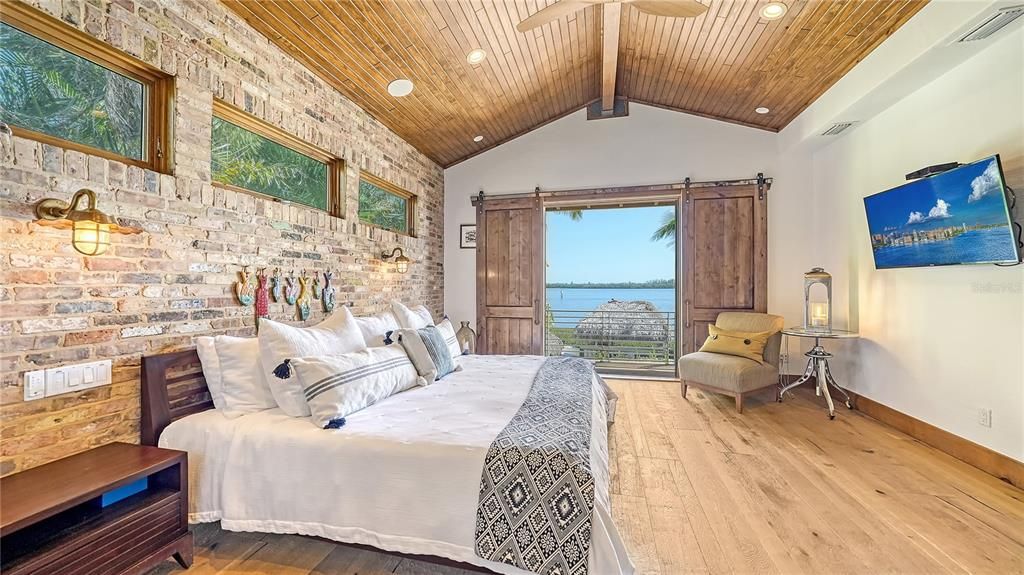 Experience luxury waterfront living at its finest with this stunning custom estate in 10216 46th Avenue W, Bradenton, Florida.