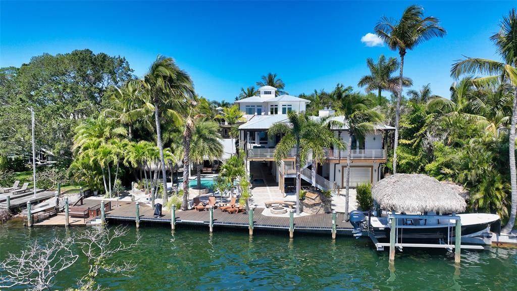 Experience luxury waterfront living at its finest with this stunning custom estate in 10216 46th Avenue W, Bradenton, Florida.