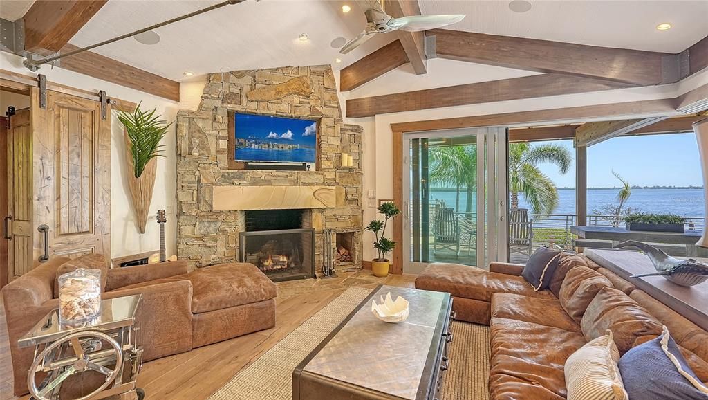 Experience luxury waterfront living at its finest with this stunning custom estate in 10216 46th Avenue W, Bradenton, Florida.