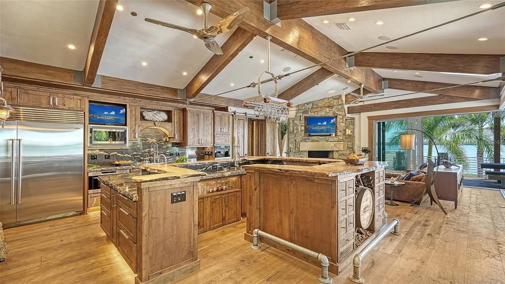 Experience luxury waterfront living at its finest with this stunning custom estate in 10216 46th Avenue W, Bradenton, Florida.