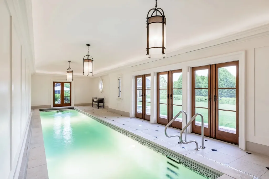 0 Meetinghouse Road, New Hope, Pennsylvania. Meticulously crafted by renowned professionals, this extraordinary estate is nestled in a coveted location off one of Bucks County's most desirable roads. Spanning 44 acres of serene privacy, the residence embodies timeless elegance and meticulous attention to detail. Designed by acclaimed architect Allan Greenberg and featuring the impeccable landscape work of Barbara Paca, this bespoke home seamlessly blends classical elements with modern sophistication.