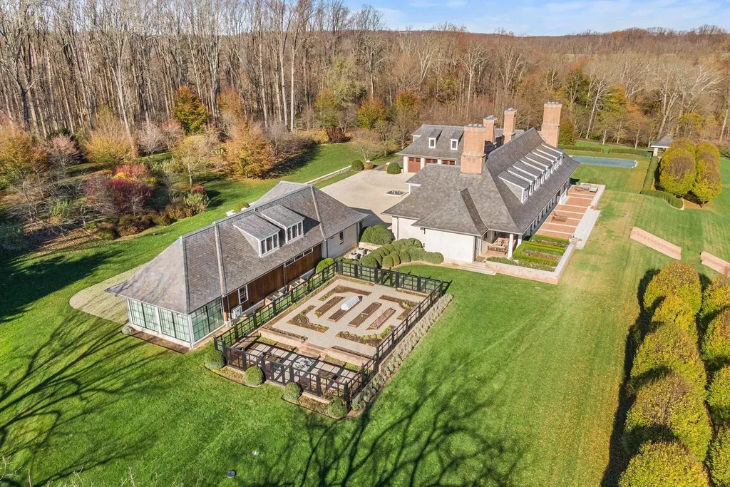 0 Meetinghouse Road, New Hope, Pennsylvania. Meticulously crafted by renowned professionals, this extraordinary estate is nestled in a coveted location off one of Bucks County's most desirable roads. Spanning 44 acres of serene privacy, the residence embodies timeless elegance and meticulous attention to detail. Designed by acclaimed architect Allan Greenberg and featuring the impeccable landscape work of Barbara Paca, this bespoke home seamlessly blends classical elements with modern sophistication.