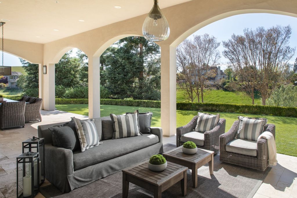10450 Serra Street Home in Cupertino, California. A Private Silicon Valley Haven - This exceptional estate is tucked away in a tranquil cul-de-sac, providing a serene retreat within close proximity to the vibrant Silicon Valley. Surrounded by the natural beauty of Rancho San Antonio Preserve, this stunning home offers hiking and biking trails and breathtaking views. 