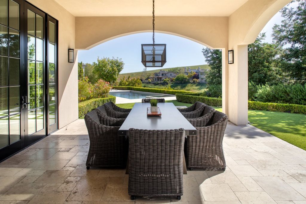 10450 Serra Street Home in Cupertino, California. A Private Silicon Valley Haven - This exceptional estate is tucked away in a tranquil cul-de-sac, providing a serene retreat within close proximity to the vibrant Silicon Valley. Surrounded by the natural beauty of Rancho San Antonio Preserve, this stunning home offers hiking and biking trails and breathtaking views. 