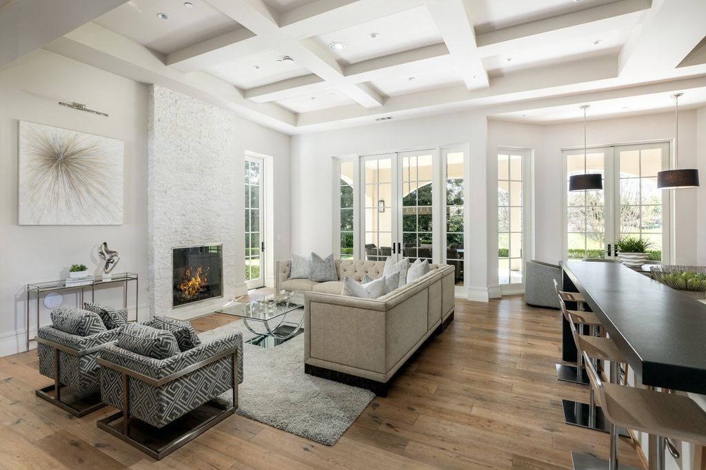 10450 Serra Street Home in Cupertino, California. A Private Silicon Valley Haven - This exceptional estate is tucked away in a tranquil cul-de-sac, providing a serene retreat within close proximity to the vibrant Silicon Valley. Surrounded by the natural beauty of Rancho San Antonio Preserve, this stunning home offers hiking and biking trails and breathtaking views. 