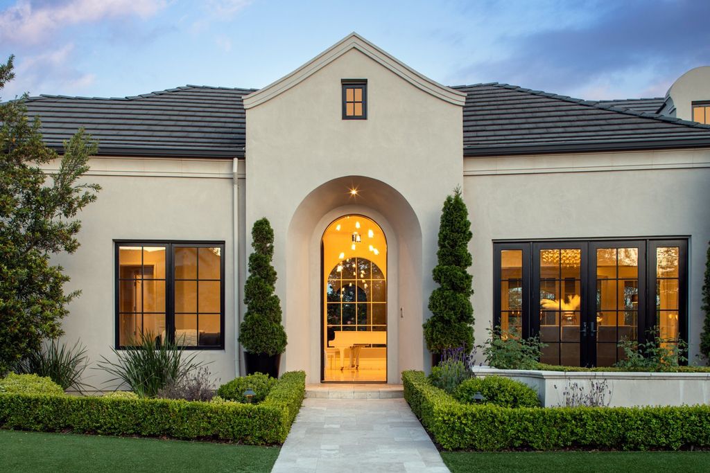 10450 Serra Street Home in Cupertino, California. A Private Silicon Valley Haven - This exceptional estate is tucked away in a tranquil cul-de-sac, providing a serene retreat within close proximity to the vibrant Silicon Valley. Surrounded by the natural beauty of Rancho San Antonio Preserve, this stunning home offers hiking and biking trails and breathtaking views. 