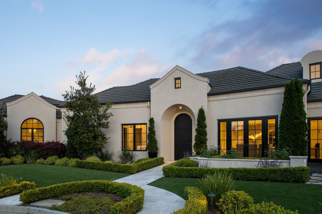 10450 Serra Street Home in Cupertino, California. A Private Silicon Valley Haven - This exceptional estate is tucked away in a tranquil cul-de-sac, providing a serene retreat within close proximity to the vibrant Silicon Valley. Surrounded by the natural beauty of Rancho San Antonio Preserve, this stunning home offers hiking and biking trails and breathtaking views. 