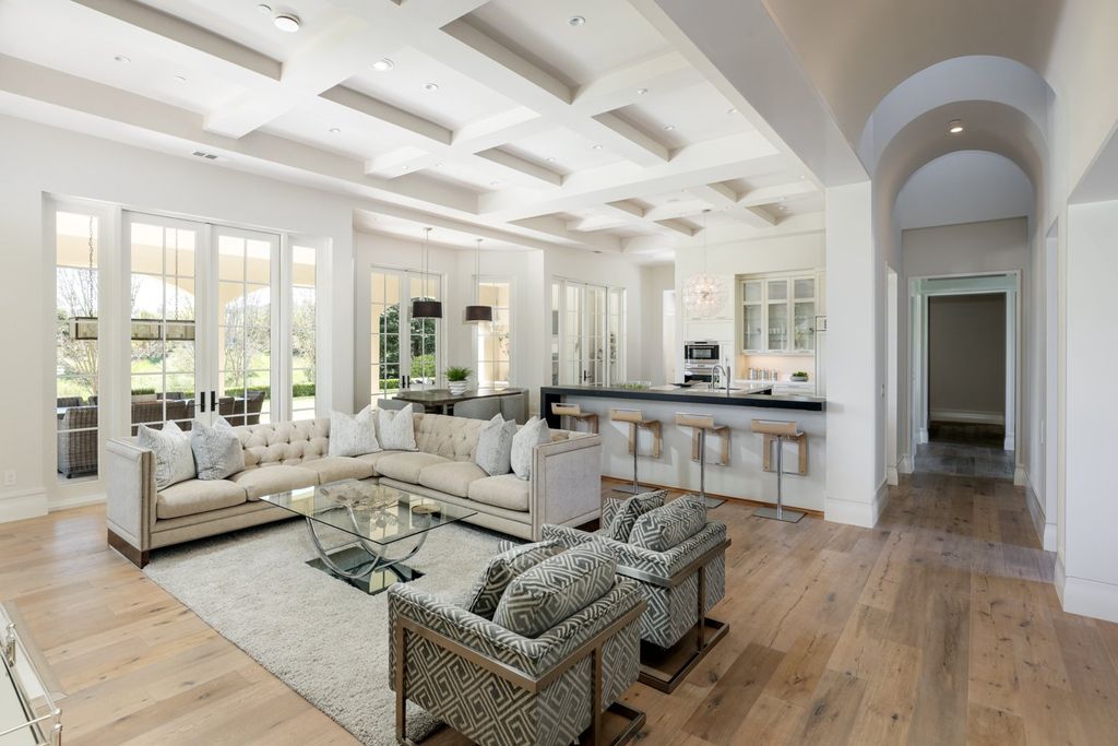 10450 Serra Street Home in Cupertino, California. A Private Silicon Valley Haven - This exceptional estate is tucked away in a tranquil cul-de-sac, providing a serene retreat within close proximity to the vibrant Silicon Valley. Surrounded by the natural beauty of Rancho San Antonio Preserve, this stunning home offers hiking and biking trails and breathtaking views. 
