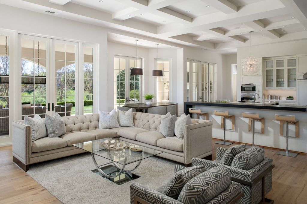 10450 Serra Street Home in Cupertino, California. A Private Silicon Valley Haven - This exceptional estate is tucked away in a tranquil cul-de-sac, providing a serene retreat within close proximity to the vibrant Silicon Valley. Surrounded by the natural beauty of Rancho San Antonio Preserve, this stunning home offers hiking and biking trails and breathtaking views. 