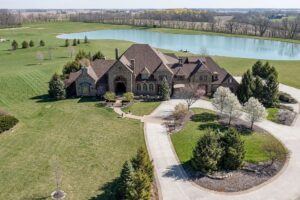 Stunning 6-Bedroom Estate on 13 Acres with a Private 7-Acre Pond in Noblesville, Indiana Asking for $5,995,000 1 12304 E 196th Street Noblesville Indiana 21