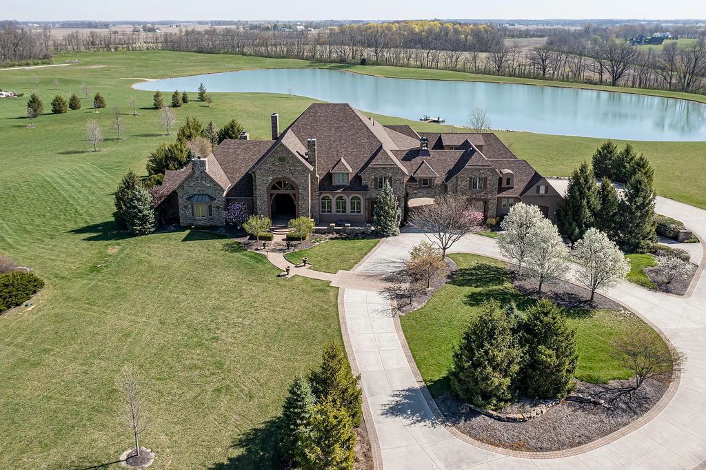 12304 E 196th Street Home in Noblesville, Indiana. Experience luxurious living in this exquisite estate located in Canterbury Estates, Noblesville, Indiana. With 6 bedrooms, 10 bathrooms, and over 19,000 square feet of living space on a 13-acre lot, this property offers complete privacy and stunning views overlooking a 7-acre stocked pond.