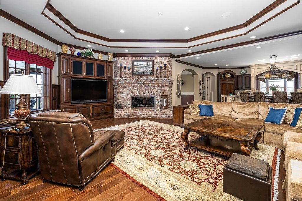12304 E 196th Street Home in Noblesville, Indiana. Experience luxurious living in this exquisite estate located in Canterbury Estates, Noblesville, Indiana. With 6 bedrooms, 10 bathrooms, and over 19,000 square feet of living space on a 13-acre lot, this property offers complete privacy and stunning views overlooking a 7-acre stocked pond.