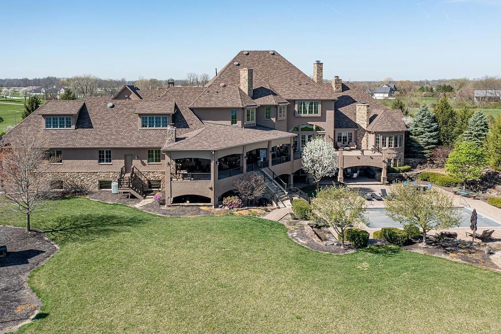 12304 E 196th Street Home in Noblesville, Indiana. Experience luxurious living in this exquisite estate located in Canterbury Estates, Noblesville, Indiana. With 6 bedrooms, 10 bathrooms, and over 19,000 square feet of living space on a 13-acre lot, this property offers complete privacy and stunning views overlooking a 7-acre stocked pond.