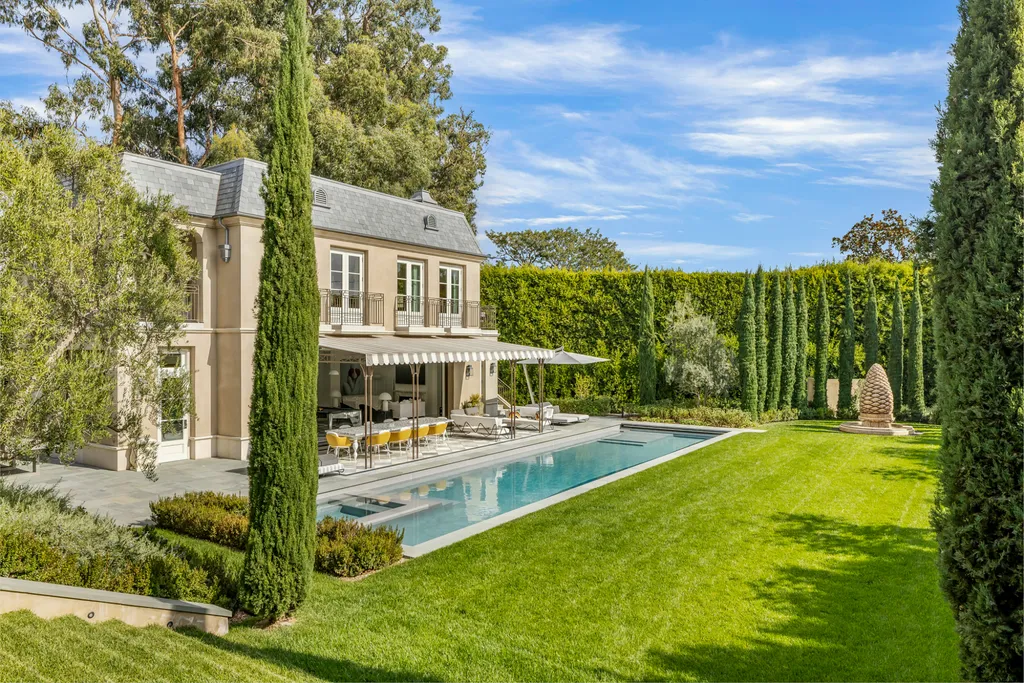 12770 S Bristol Circle Home in Los Angeles, California. Welcome to Bristol Chateau, a stunning classical residence designed by Studio William Hefner in the prestigious Brentwood Park neighborhood. This remarkable estate presents a seamless blend of traditional and contemporary styles. With meticulous attention to detail, Hefner has transformed this French chateau-inspired property into a truly exceptional living space.