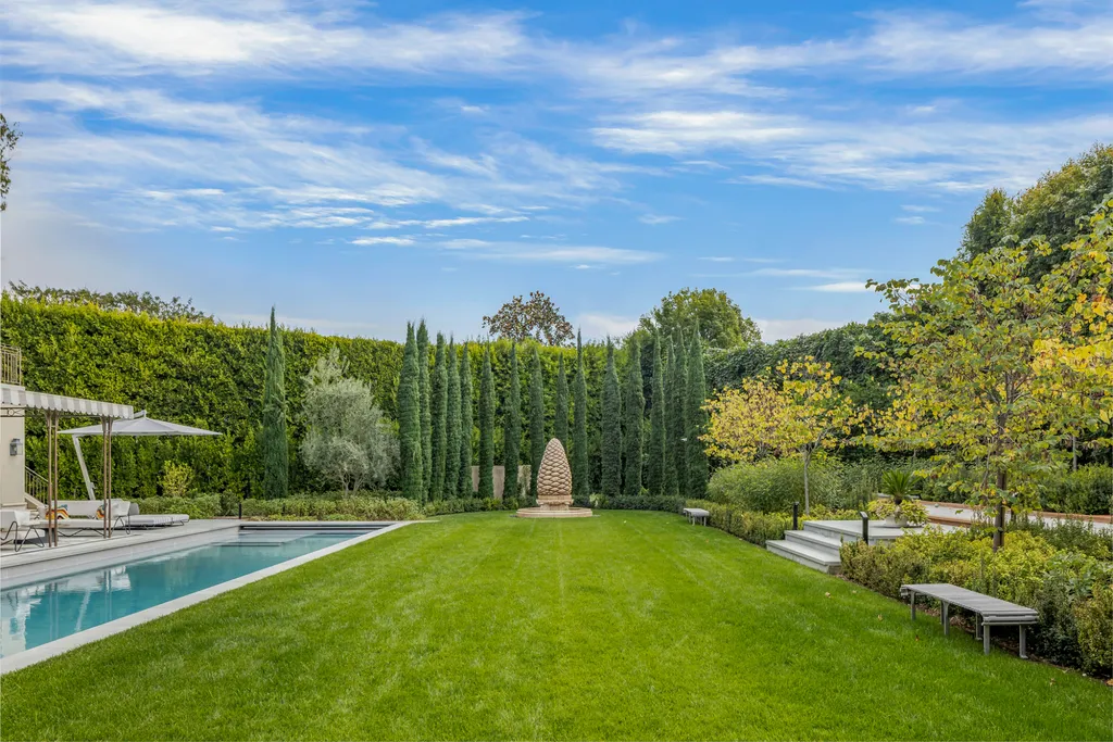 12770 S Bristol Circle Home in Los Angeles, California. Welcome to Bristol Chateau, a stunning classical residence designed by Studio William Hefner in the prestigious Brentwood Park neighborhood. This remarkable estate presents a seamless blend of traditional and contemporary styles. With meticulous attention to detail, Hefner has transformed this French chateau-inspired property into a truly exceptional living space.