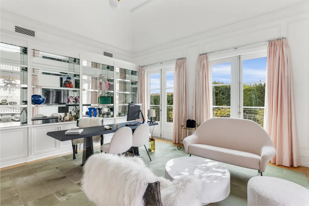 12770 S Bristol Circle Home in Los Angeles, California. Welcome to Bristol Chateau, a stunning classical residence designed by Studio William Hefner in the prestigious Brentwood Park neighborhood. This remarkable estate presents a seamless blend of traditional and contemporary styles. With meticulous attention to detail, Hefner has transformed this French chateau-inspired property into a truly exceptional living space.
