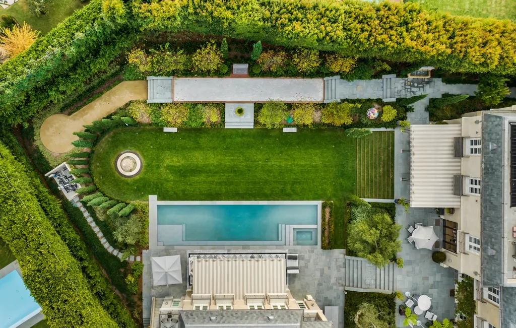 12770 S Bristol Circle Home in Los Angeles, California. Welcome to Bristol Chateau, a stunning classical residence designed by Studio William Hefner in the prestigious Brentwood Park neighborhood. This remarkable estate presents a seamless blend of traditional and contemporary styles. With meticulous attention to detail, Hefner has transformed this French chateau-inspired property into a truly exceptional living space.