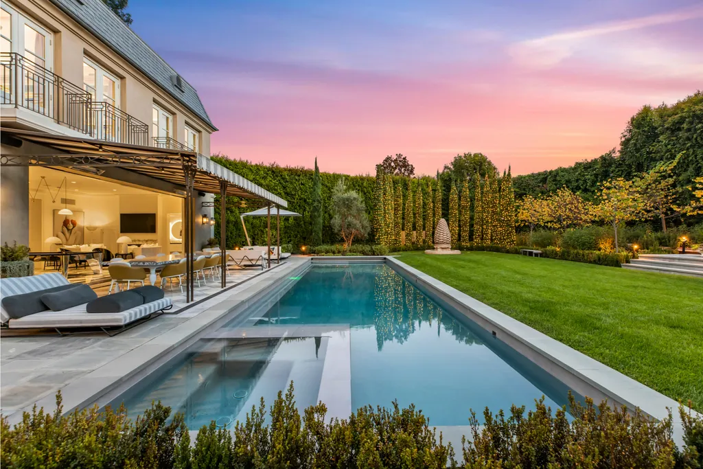 12770 S Bristol Circle Home in Los Angeles, California. Welcome to Bristol Chateau, a stunning classical residence designed by Studio William Hefner in the prestigious Brentwood Park neighborhood. This remarkable estate presents a seamless blend of traditional and contemporary styles. With meticulous attention to detail, Hefner has transformed this French chateau-inspired property into a truly exceptional living space.