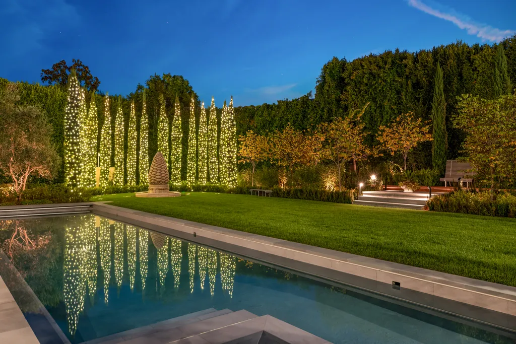 12770 S Bristol Circle Home in Los Angeles, California. Welcome to Bristol Chateau, a stunning classical residence designed by Studio William Hefner in the prestigious Brentwood Park neighborhood. This remarkable estate presents a seamless blend of traditional and contemporary styles. With meticulous attention to detail, Hefner has transformed this French chateau-inspired property into a truly exceptional living space.