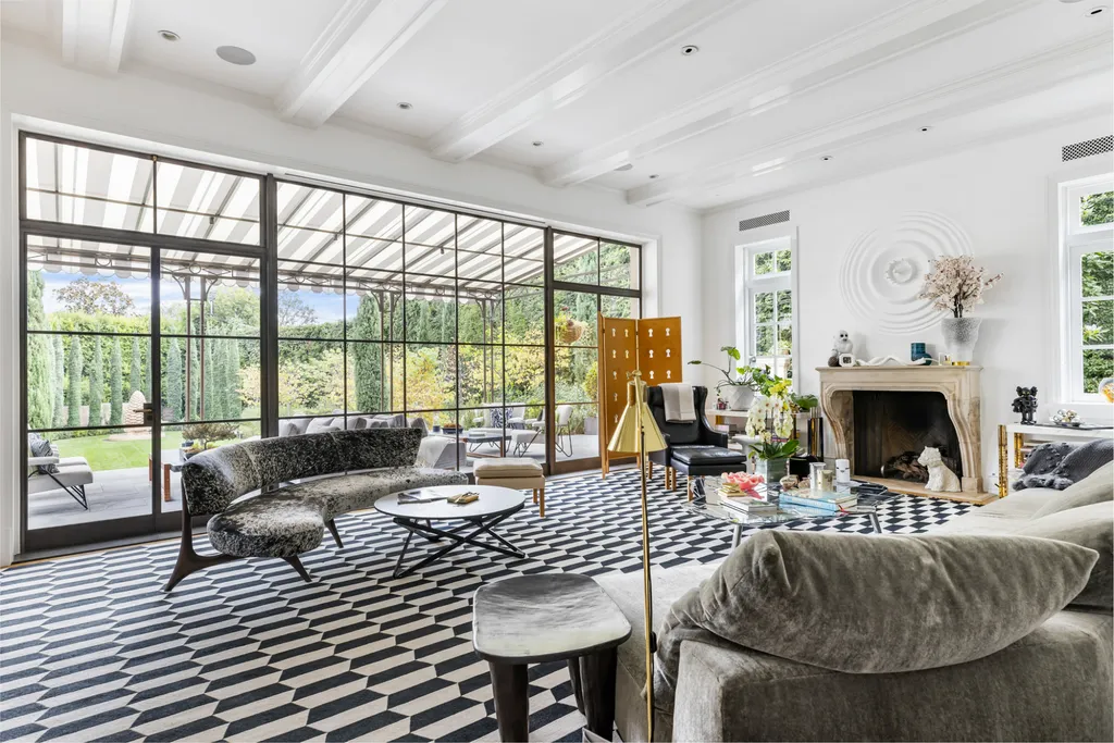 12770 S Bristol Circle Home in Los Angeles, California. Welcome to Bristol Chateau, a stunning classical residence designed by Studio William Hefner in the prestigious Brentwood Park neighborhood. This remarkable estate presents a seamless blend of traditional and contemporary styles. With meticulous attention to detail, Hefner has transformed this French chateau-inspired property into a truly exceptional living space.