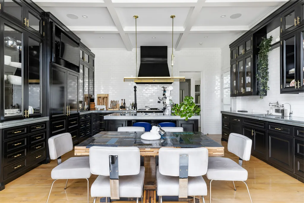 12770 S Bristol Circle Home in Los Angeles, California. Welcome to Bristol Chateau, a stunning classical residence designed by Studio William Hefner in the prestigious Brentwood Park neighborhood. This remarkable estate presents a seamless blend of traditional and contemporary styles. With meticulous attention to detail, Hefner has transformed this French chateau-inspired property into a truly exceptional living space.