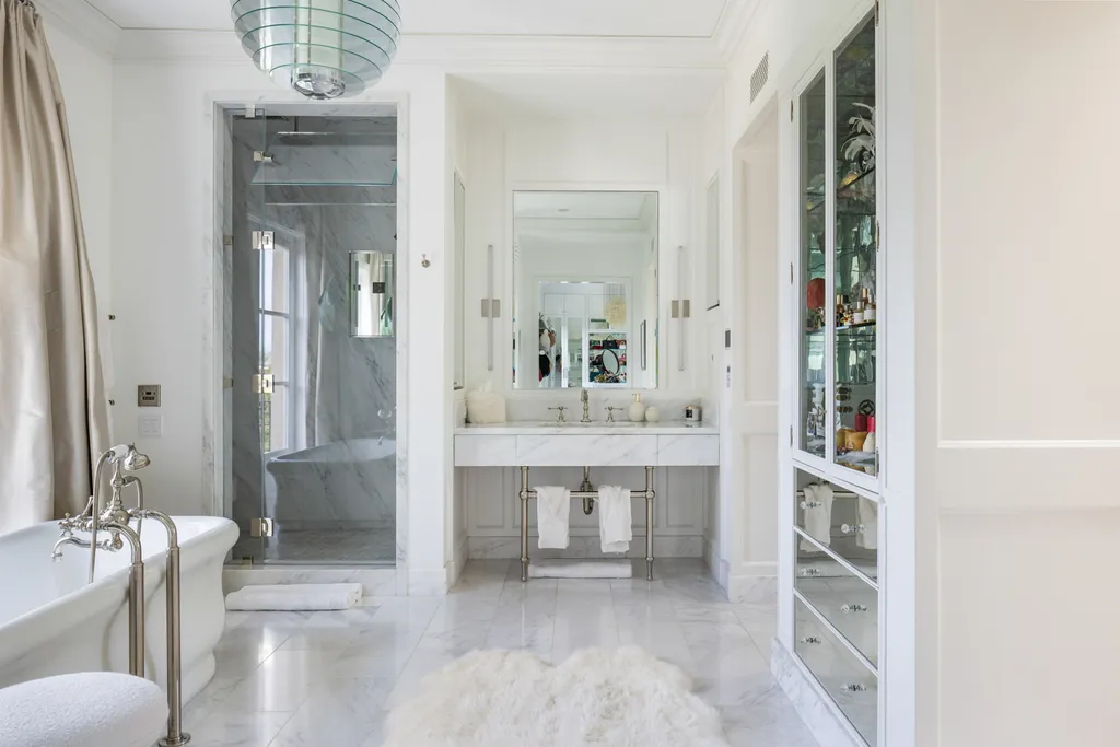12770 S Bristol Circle Home in Los Angeles, California. Welcome to Bristol Chateau, a stunning classical residence designed by Studio William Hefner in the prestigious Brentwood Park neighborhood. This remarkable estate presents a seamless blend of traditional and contemporary styles. With meticulous attention to detail, Hefner has transformed this French chateau-inspired property into a truly exceptional living space.