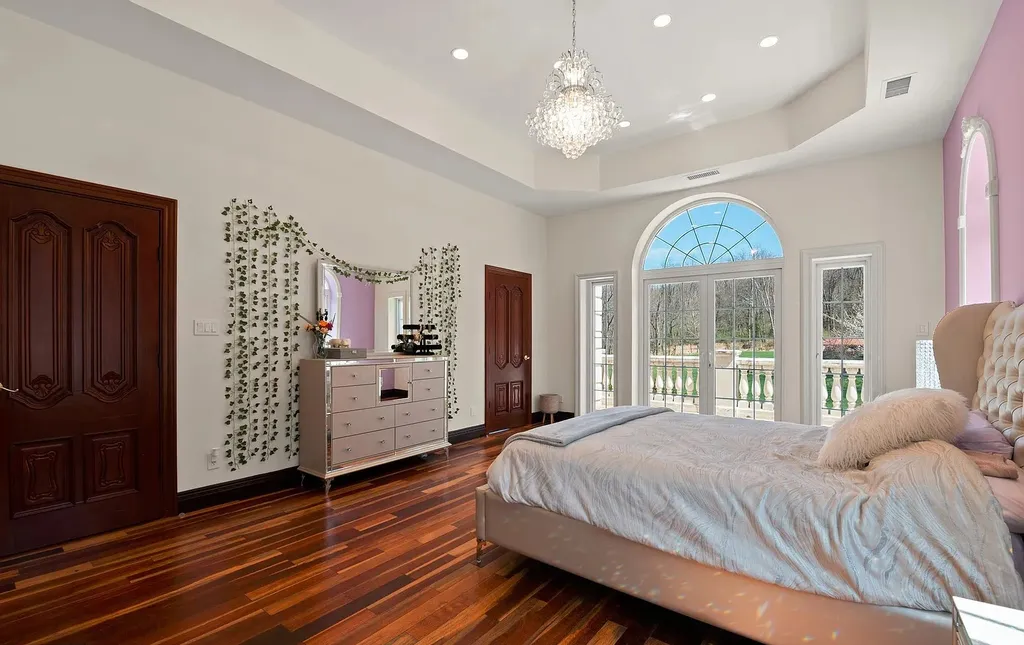 1284 Eagle Road Home in New Hope, Pennsylvania. Prepare to be mesmerized by this extraordinary palatial estate home nestled in the highly sought-after Upper Makefield area of Bucks County. Poised on 11+ acres and seamlessly integrated into the hillside of Jericho Mountain, this remarkable residence spans over 19,000 square feet, offering a level of detail and amenities that are truly unparalleled. A stunning example of French European architecture, this one-of-a-kind mansion boasts a myriad of exquisite features and finishes that will leave you in awe.