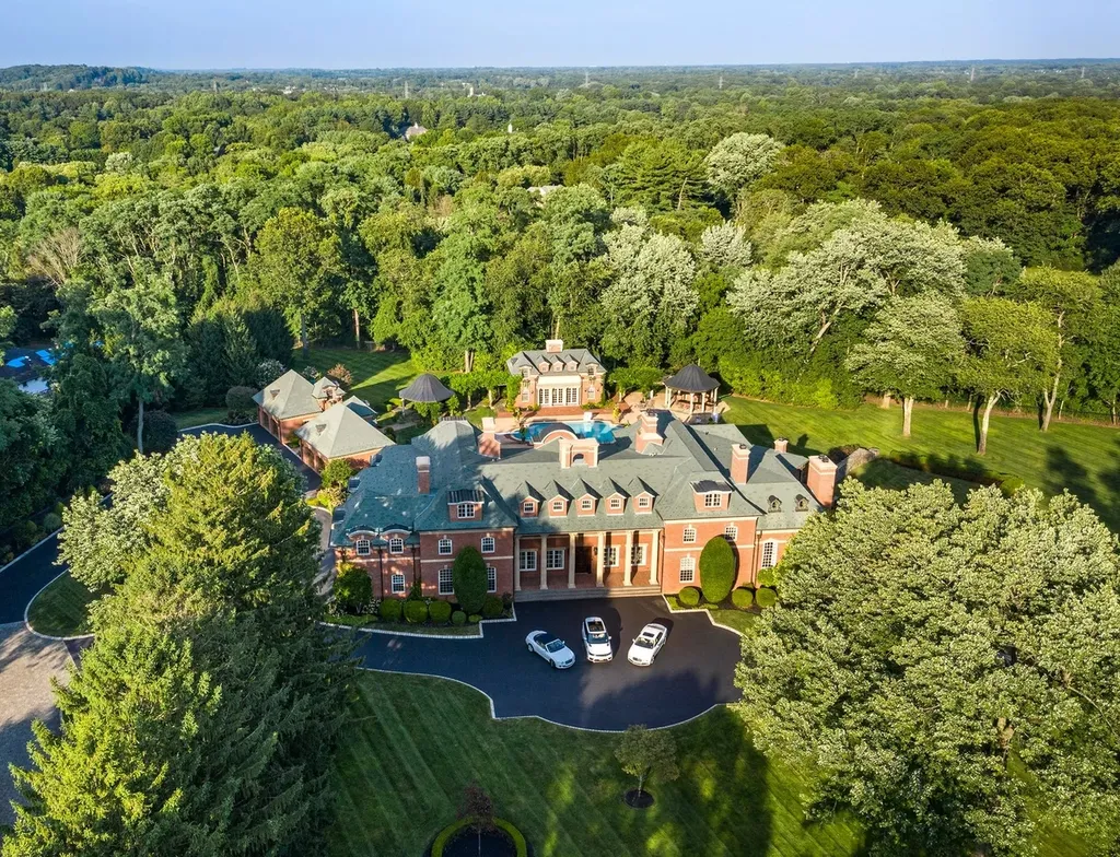 152 Bucks Mill Road Home in Colts Neck, New Jersey. One of the most magnificent estates in Colts Neck Township, New Jersey, where elegance and sophistication intertwine to create a truly exceptional living experience. As you pass through the iron gates and step onto the breathtaking grounds, it becomes evident that you have arrived at a place of unparalleled luxury.