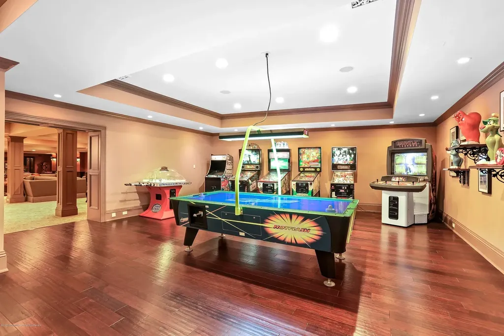 152 Bucks Mill Road Home in Colts Neck, New Jersey. One of the most magnificent estates in Colts Neck Township, New Jersey, where elegance and sophistication intertwine to create a truly exceptional living experience. As you pass through the iron gates and step onto the breathtaking grounds, it becomes evident that you have arrived at a place of unparalleled luxury.