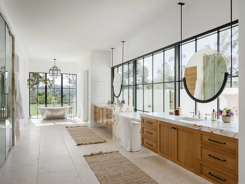 15250 Las Planideras Home in Rancho Santa Fe, California. Discover the extraordinary 15250 Las Planideras, a brand-new single-story custom home located on the desirable west side of Rancho Santa Fe. Built by the award-winning Herbst Construction and designed by Atelier A.Tesselaar, this exceptional property sits on nearly three acres of flat usable land.