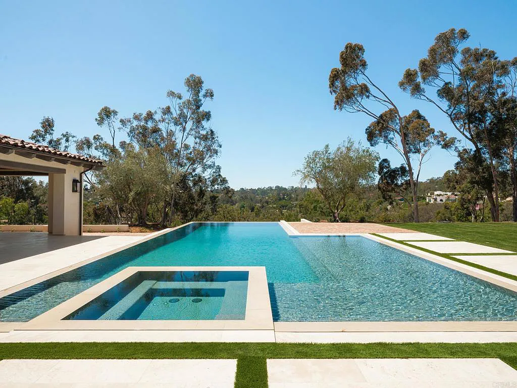 15250 Las Planideras Home in Rancho Santa Fe, California. Discover the extraordinary 15250 Las Planideras, a brand-new single-story custom home located on the desirable west side of Rancho Santa Fe. Built by the award-winning Herbst Construction and designed by Atelier A.Tesselaar, this exceptional property sits on nearly three acres of flat usable land.