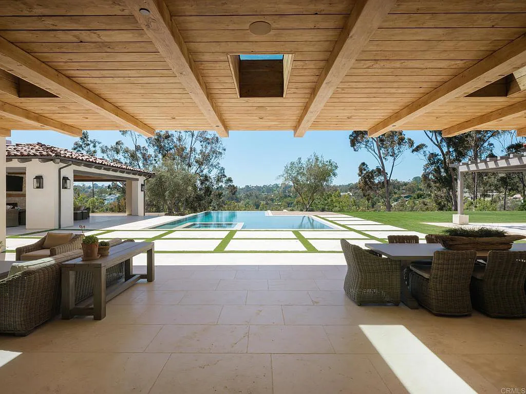 15250 Las Planideras Home in Rancho Santa Fe, California. Discover the extraordinary 15250 Las Planideras, a brand-new single-story custom home located on the desirable west side of Rancho Santa Fe. Built by the award-winning Herbst Construction and designed by Atelier A.Tesselaar, this exceptional property sits on nearly three acres of flat usable land.