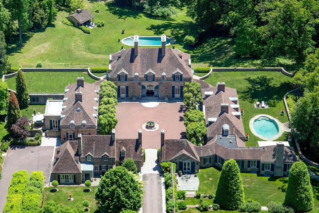 1543 Monk Road HOMESITE 1 Home in Gladwyne, Pennsylvania. Situated on 32.1 acres in the exclusive Philadelphia Main Line area, Linden Hill offers a unique opportunity to experience the epitome of estate living. This historic property, designed by renowned architect Edmund B. Gilchrist, showcases world-class architecture and a secluded, park-like setting. Impeccably maintained by its owners, the main residence and its dependencies exude timeless charm while incorporating 21st century amenities.