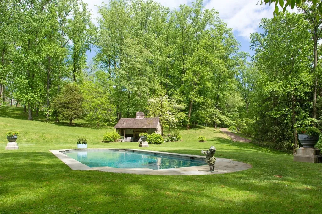 1543 Monk Road HOMESITE 1 Home in Gladwyne, Pennsylvania. Situated on 32.1 acres in the exclusive Philadelphia Main Line area, Linden Hill offers a unique opportunity to experience the epitome of estate living. This historic property, designed by renowned architect Edmund B. Gilchrist, showcases world-class architecture and a secluded, park-like setting. Impeccably maintained by its owners, the main residence and its dependencies exude timeless charm while incorporating 21st century amenities.