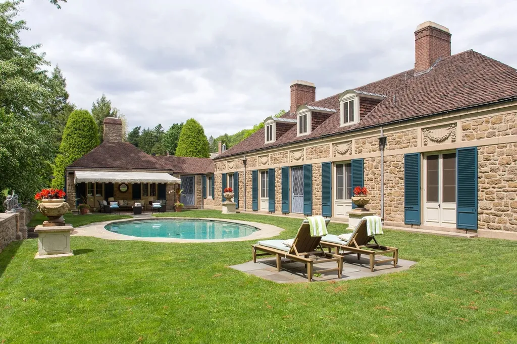 1543 Monk Road HOMESITE 1 Home in Gladwyne, Pennsylvania. Situated on 32.1 acres in the exclusive Philadelphia Main Line area, Linden Hill offers a unique opportunity to experience the epitome of estate living. This historic property, designed by renowned architect Edmund B. Gilchrist, showcases world-class architecture and a secluded, park-like setting. Impeccably maintained by its owners, the main residence and its dependencies exude timeless charm while incorporating 21st century amenities.