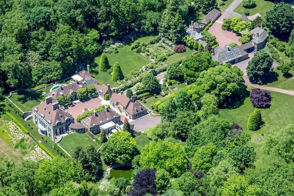 1543 Monk Road HOMESITE 1 Home in Gladwyne, Pennsylvania. Situated on 32.1 acres in the exclusive Philadelphia Main Line area, Linden Hill offers a unique opportunity to experience the epitome of estate living. This historic property, designed by renowned architect Edmund B. Gilchrist, showcases world-class architecture and a secluded, park-like setting. Impeccably maintained by its owners, the main residence and its dependencies exude timeless charm while incorporating 21st century amenities.