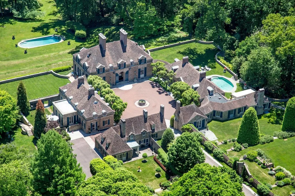 1543 Monk Road HOMESITE 1 Home in Gladwyne, Pennsylvania. Situated on 32.1 acres in the exclusive Philadelphia Main Line area, Linden Hill offers a unique opportunity to experience the epitome of estate living. This historic property, designed by renowned architect Edmund B. Gilchrist, showcases world-class architecture and a secluded, park-like setting. Impeccably maintained by its owners, the main residence and its dependencies exude timeless charm while incorporating 21st century amenities.